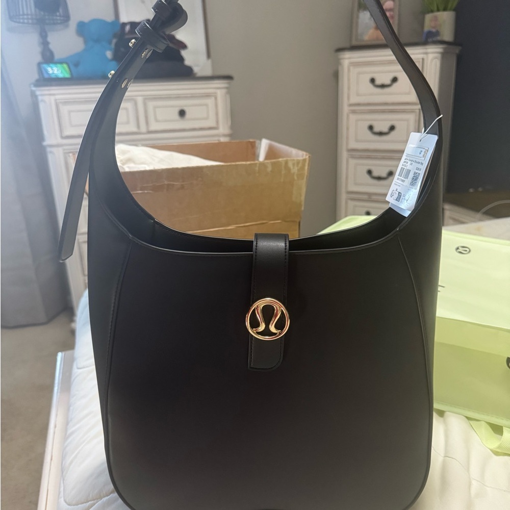 lululemon athletica Black and Gold Shoulder Bag